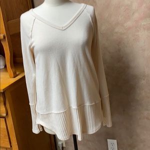 MTS white sweater